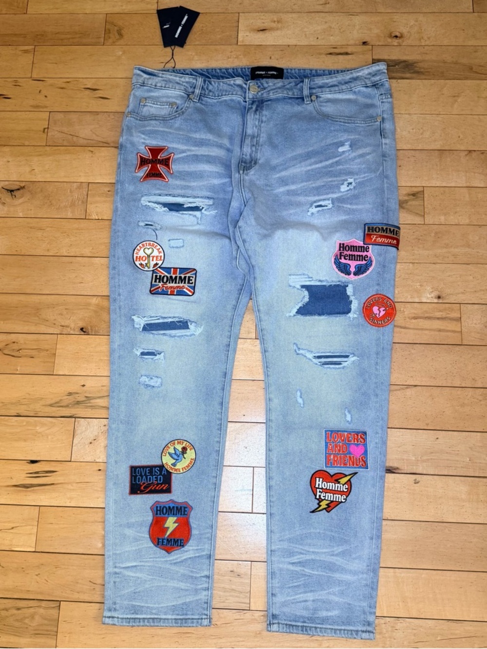 Homme Femme Light Blue Slim Straight Jeans with Graphic Patches